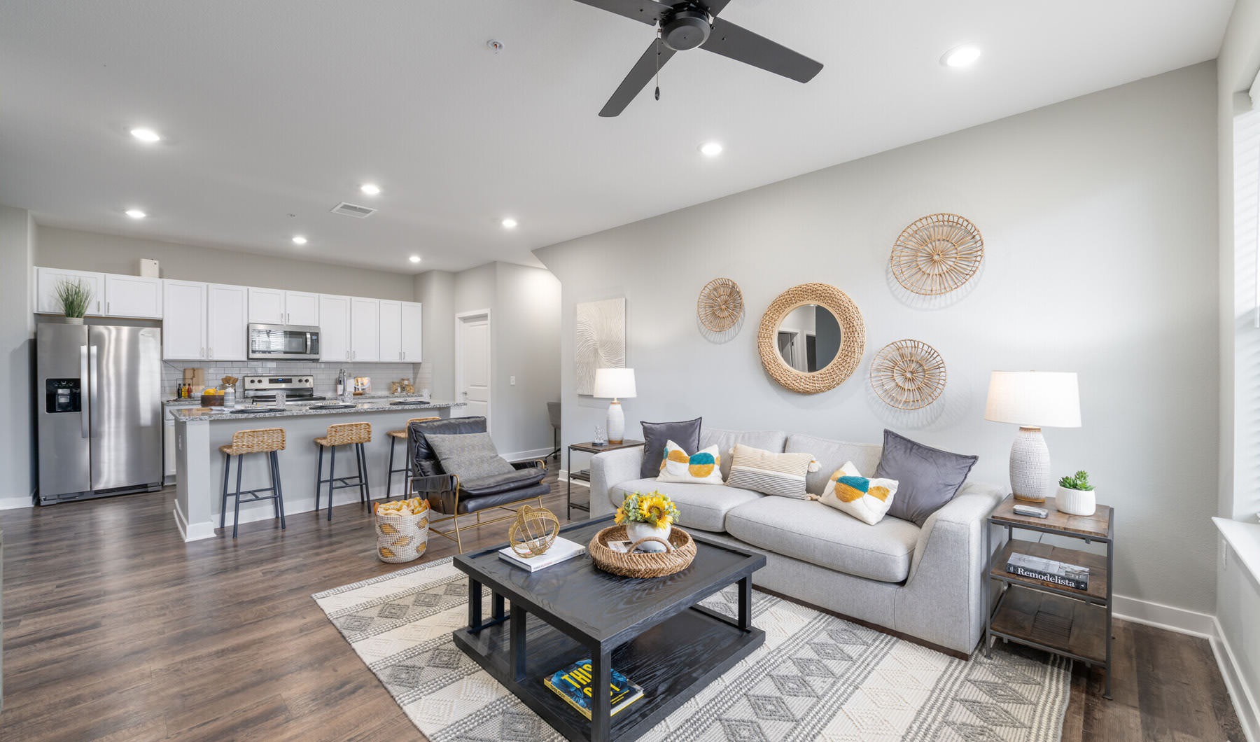 recessed lighting throughout open concept apartment interiors